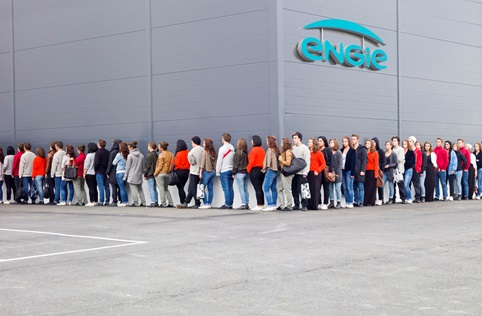 Long Line of People Wrapping Around Engie Building