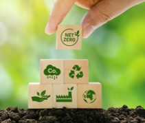Stacking wooden blocks with various clean energy slogans