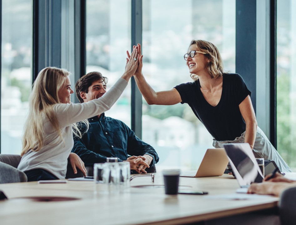 Co-Workers High Fiving