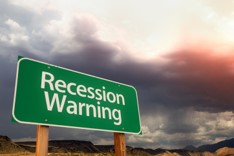 Sign that reads Recession Warning