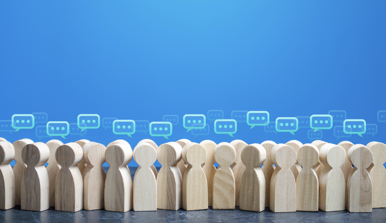 Image of wooden people talking