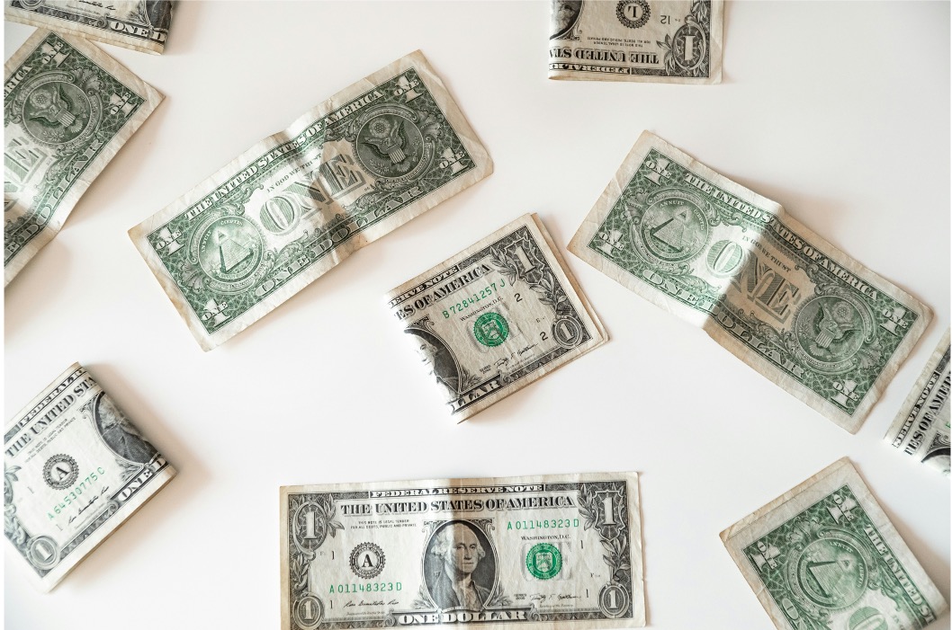 Dollar bills on a table
