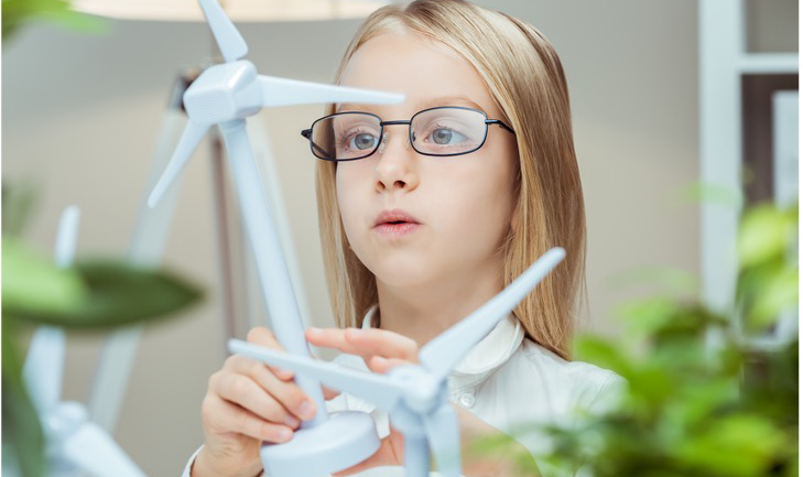 Girl playing with windmills