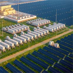 Overhead view of solar panels and large batteries